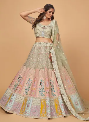 Aesthetic Pista Green Color Net Base Lehenga Choli With Heavy Resham Work