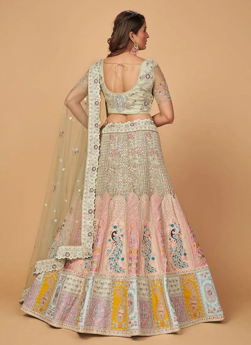 Aesthetic Pista Green Color Net Base Lehenga Choli With Heavy Resham Work