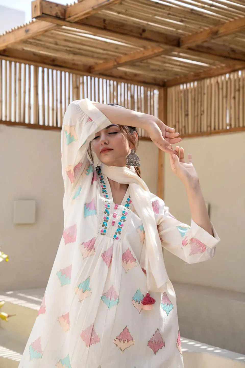 OFF-WHITE PASTEL GEOMETRIC PRINTED A-LINE KURTA SET WITH EMBROIDERED DETAILING & DUPATTA