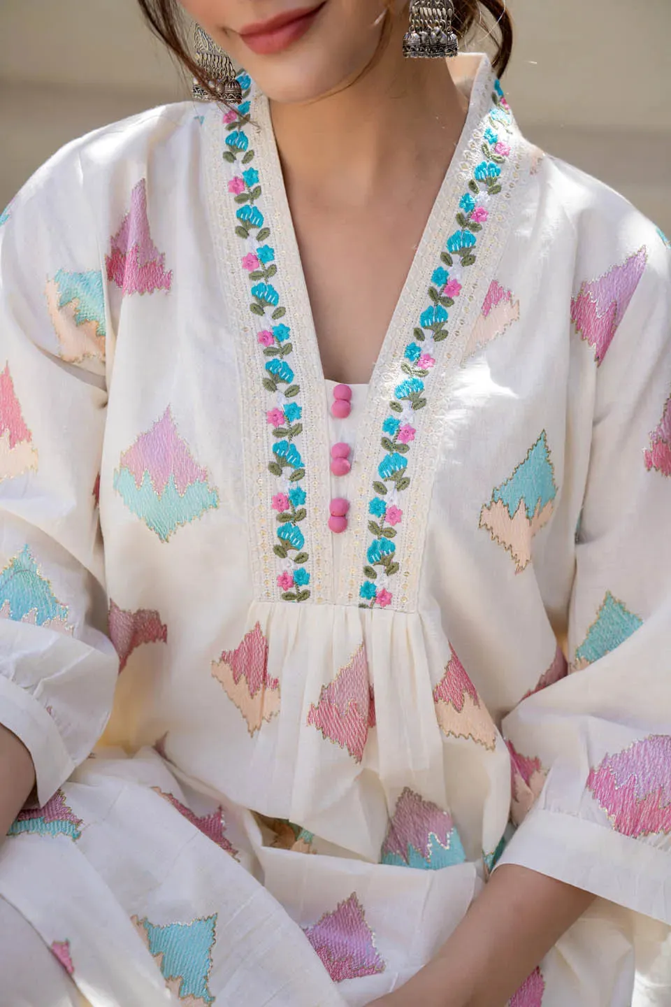 OFF-WHITE PASTEL GEOMETRIC PRINTED A-LINE KURTA SET WITH EMBROIDERED DETAILING & DUPATTA